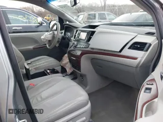 2013 Toyota Sienna XLE with VIN 5TDDK3DC7DS056599, listed as a IAAI auction lot 41736510 with 120,230 mi miles and . Bid and sale history available at DreamBid. Image 5.