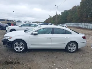 2016 Volkswagen CC Sport with VIN WVWBN7AN4GE512547, listed as a IAAI auction lot 40802001 with 94,513 mi miles. Bid and sale history available at carsss.com. Image 15.