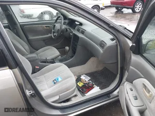 2000 Toyota Camry CE with VIN 4T1BG22K4YU678040, listed as a IAAI auction lot 42012146 with 112,714 mi miles. Bid and sale history available at carsss.com. Image 5.