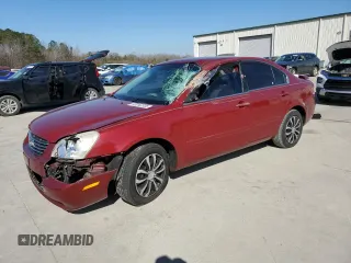 2007 Kia Optima LX z VIN KNAGE123075113891, wystawiony jako Copart lot #46340305 z przebiegiem 192 496 mil mil oraz Szkoda całkowita • Salvage title. Historia ofert i sprzedaży dostępna na DreamBid. Obrazek 1.