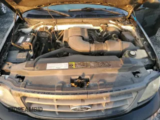 2003 Ford F-150 XL with VIN 1FTRF17W13NA97772, listed as a Copart auction lot 77692074 with Not Provided miles and Salvage Title. Bid and sale history available at DreamBid. Image 11.