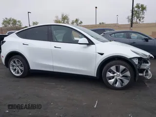 2023 Tesla Model Y Long Range z VIN 7SAYGDEE5PA063097, wystawiony jako IAAI lot #42171871 z przebiegiem Nie podano mil oraz . Historia ofert i sprzedaży dostępna na DreamBid. Obrazek 14.