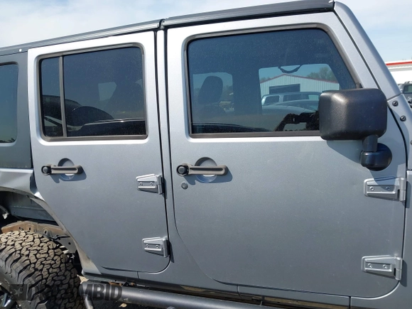 2015 Jeep Wrangler Unlimited Sahara with VIN 1C4BJWEG2FL558860, listed as a IAAI auction lot 41937360 with 113,627 mi miles. Bid and sale history available at carsss.com. Image 14.