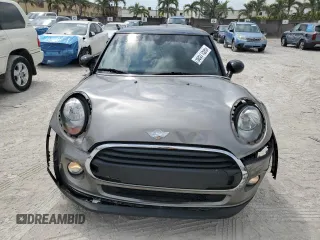 2018 MINI Hardtop Cooper with VIN WMWXP5C56J2H29012, listed as a Copart auction lot 50571595 with 77,129 mi miles and Salvage title. Bid and sale history available at DreamBid. Image 5.