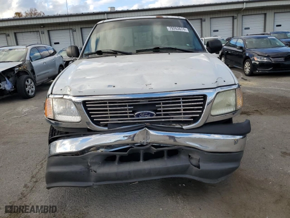 2003 Ford F-150 XL with VIN 1FTRX07243KA29505, listed as a Copart auction lot 79263674 with 188,516 mi miles and Salvage Title. Bid and sale history available at carsss.com. Image 5.