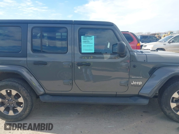 2018 Jeep Wrangler Unlimited Sahara z VIN 1C4HJXEN9JW215890, wystawiony jako IAAI lot #41215063 z przebiegiem 39 567 mil mil oraz . Historia ofert i sprzedaży dostępna na DreamBid. Obrazek 13.