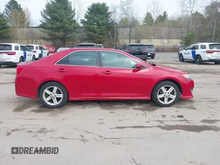 2014 Toyota Camry L with VIN 4T1BF1FK1EU758494, listed as a IAAI auction lot 42127661 with 242,112 mi miles. Bid and sale history available at carsss.com. Image 13.