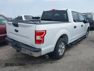 2019 Ford F-150 XL with VIN 1FTEW1C45KKC88050, listed as a IAAI auction lot 41676789 with 99,665 mi miles and . Bid and sale history available at DreamBid. Image 4.
