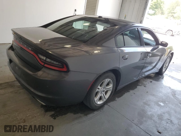 2020 Dodge Charger SXT z VIN 2C3CDXBG1LH116252, wystawiony jako Copart lot #55725565 z przebiegiem 95 039 mil mil oraz Czysty tytuł • Clean title. Historia ofert i sprzedaży dostępna na DreamBid. Obrazek 3.