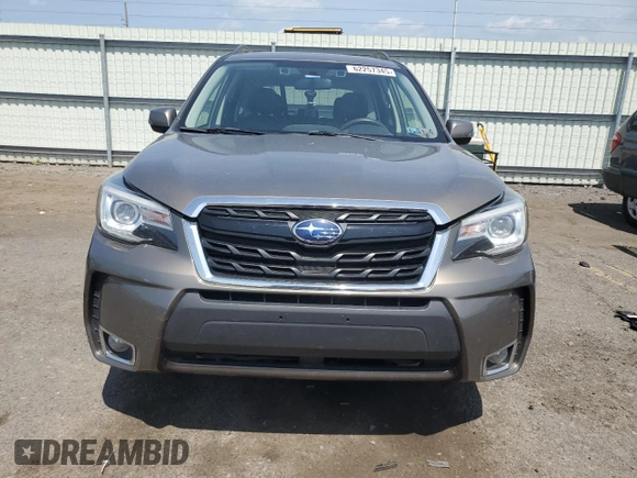 2017 Subaru Forester Touring with VIN JF2SJGWC9HH402713, listed as a Copart auction lot 62257345 with 128,903 mi miles and Salvage title. Bid and sale history available at DreamBid. Image 5.
