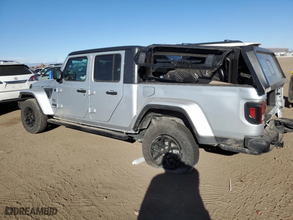 2023 Jeep Gladiator Freedom with VIN 1C6HJTAGXPL518694, listed as a Copart auction lot 86740754 with 9,460 mi miles and Salvage Title. Bid and sale history available at carsss.com. Image 2.