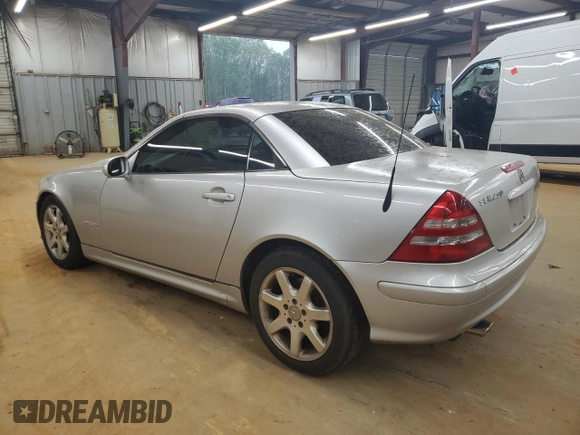 2003 Mercedes-Benz SLK-Class 2.3L with VIN WDBKK49F83F293647, listed as a Copart auction lot 51088045 with 199,456 mi miles and Salvage Title. Bid and sale history available at carsss.com. Image 2.