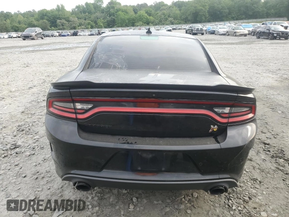 2019 Dodge Charger Scat Pack z VIN 2C3CDXGJ7KH697176, wystawiony jako Copart lot #53702845 z przebiegiem 76 988 mil mil oraz Szkoda całkowita • Salvage title. Historia ofert i sprzedaży dostępna na DreamBid. Obrazek 6.