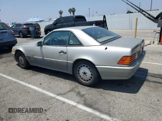 1991 Mercedes-Benz 500 с VIN WDBFA66E2MF022726, выставлен на аукционе Copart как лот 59915435 с пробегом 157 264 миль миль и Чистый • Clean title. История ставок и продаж доступна на DreamBid. Изображение 2.