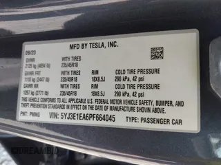 2023 Tesla Model 3 with VIN 5YJ3E1EA6PF664045, listed as a IAAI auction lot 42561039 with 18,708 mi miles and . Bid and sale history available at DreamBid. Image 9.