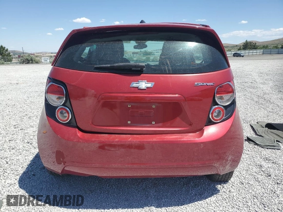 2012 Chevrolet Sonic LS z VIN 1G1JA6SH0C4113041, wystawiony jako Copart lot #58743055 z przebiegiem 69 453 mil mil oraz Szkoda całkowita • Salvage title. Historia ofert i sprzedaży dostępna na DreamBid. Obrazek 6.