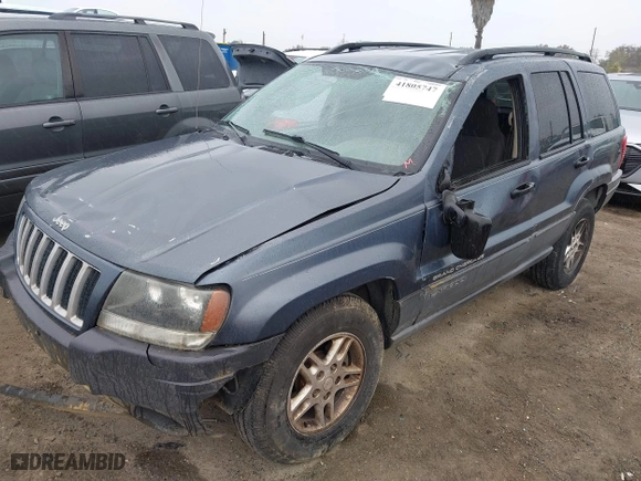 2004 Jeep Grand Cherokee Laredo with VIN 1J4GX48S64C291075, listed as a IAAI auction lot 41805747 with 282,384 mi miles. Bid and sale history available at carsss.com. Image 17.