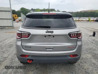 2018 Jeep Compass Trailhawk with VIN 3C4NJDDB4JT451409, listed as a Copart auction lot 58769305 with 135,562 mi miles and Clean title. Bid and sale history available at DreamBid. Image 6.