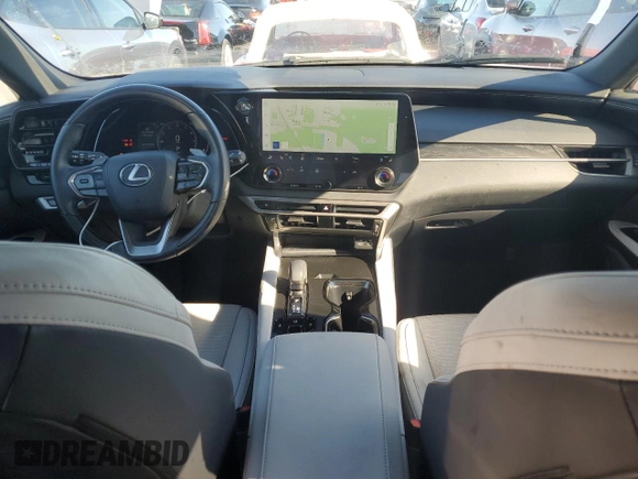 2023 Lexus RX with VIN JTJCHMAA8P2001493, listed as a Copart auction lot 74231914 with 1,228 mi miles and Non Repairable. Bid and sale history available at carsss.com. Image 8.