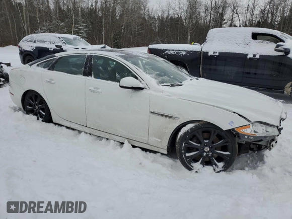 2015 Jaguar XJ Premium Luxury with VIN SAJXJ1CD0F8V88669, listed as a Copart auction lot 86063734 with 155,712 mi miles and Clean Title. Bid and sale history available at DreamBid. Image 4.