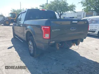 2015 Ford F-150 XL with VIN 1FTEW1CG2FFC70680, listed as a IAAI auction lot 41871782 with 143,875 mi miles. Bid and sale history available at carsss.com. Image 3.
