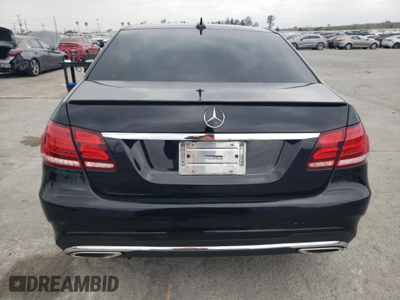 2014 Mercedes-Benz E 350 Sport with VIN WDDHF5KB7EB050618, listed as a Copart auction lot 50875045 with 157,722 mi miles and Salvage Title. Bid and sale history available at DreamBid. Image 6.