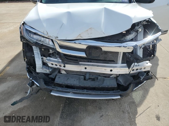 2022 Honda Pilot Touring 7-Passenger with VIN 5FNYF6H67NB018467, listed as a Copart auction lot 45358605 with 29,268 mi miles and Salvage Title. Bid and sale history available at carsss.com. Image 12.