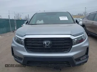2021 Honda Ridgeline RTL-E with VIN 5FPYK3F79MB010091, listed as a IAAI auction lot 41386318 with 37,996 mi miles and . Bid and sale history available at DreamBid. Image 12.
