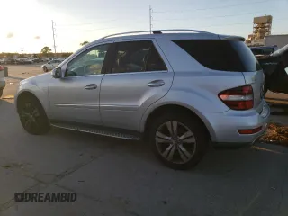 2009 Mercedes-Benz M 3.5L with VIN 4JGBB56EX9A521264, listed as a Copart auction lot 87000234 with 239,700 mi miles and Clean Title. Bid and sale history available at carsss.com. Image 2.