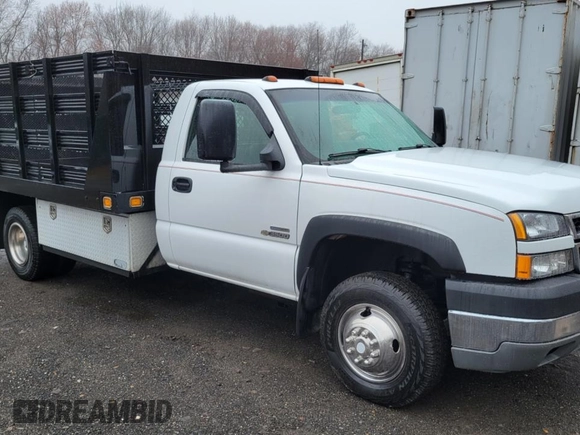 2007 Chevrolet Silverado 1500 with VIN 1GBJC34D67E167779, listed as a Copart auction lot 52091775 with 166,218 mi miles and Clean Title. Bid and sale history available at DreamBid. Image 3.
