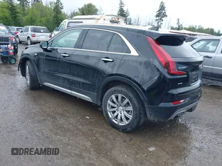 2020 Cadillac XT4 AWD Premium Luxury z VIN 1GYFZDR45LF049638, wystawiony jako IAAI lot #42216996 z przebiegiem 82 760 mil mil oraz . Historia ofert i sprzedaży dostępna na DreamBid. Obrazek 3.