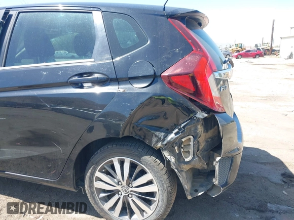 2015 Honda Fit EX-L z VIN 3HGGK5H88FM706513, wystawiony jako IAAI lot #42493772 z przebiegiem 173 129 mil mil oraz . Historia ofert i sprzedaży dostępna na DreamBid. Obrazek 12.