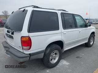 1998 Ford Explorer XL z VIN 1FMZU34E0WZB12557, wystawiony jako IAAI lot #41474546 z przebiegiem 119 294 mil mil oraz . Historia ofert i sprzedaży dostępna na DreamBid. Obrazek 4.
