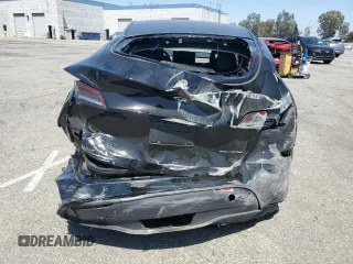 2024 Tesla Model Y Long Range with VIN 7SAYGDEE0RF123793, listed as a Copart auction lot 57177305 with 20,053 mi miles and Salvage title. Bid and sale history available at DreamBid. Image 6.