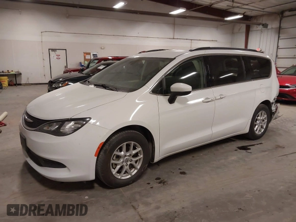 2021 Chrysler Voyager LXi with VIN 2C4RC1DG5MR508956, listed as a IAAI auction lot 41547647 with 104,563 mi miles and . Bid and sale history available at DreamBid. Image 2.
