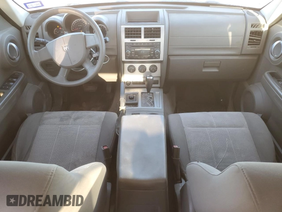 2007 Dodge Nitro SXT with VIN 1D8GU28K87W728744, listed as a Copart auction lot 77082954 with 245,632 mi miles and Salvage title. Bid and sale history available at DreamBid. Image 8.