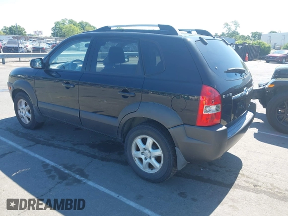 2005 Hyundai Tucson GLS with VIN KM8JN72D95U193338, listed as a IAAI auction lot 42205240 with 172,424 mi miles. Bid and sale history available at carsss.com. Image 3.