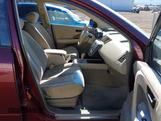 2005 Nissan Murano SL z VIN JN8AZ08W35W410982, wystawiony jako IAAI lot #42349257 z przebiegiem 102 418 mil mil oraz . Historia ofert i sprzedaży dostępna na DreamBid. Obrazek 5.