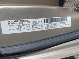 2013 Chrysler Town & Country Touring with VIN 2C4RC1BG7DR621665, listed as a IAAI auction lot 42133109 with 135,898 mi miles and . Bid and sale history available at DreamBid. Image 9.
