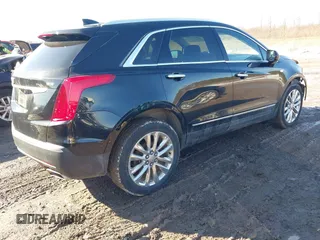 2019 Cadillac XT5 Premium Luxury AWD z VIN 1GYKNFRS1KZ250468, wystawiony jako IAAI lot #41764152 z przebiegiem 107 918 mil mil oraz . Historia ofert i sprzedaży dostępna na DreamBid. Obrazek 4.