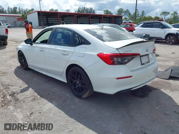 2022 Honda Civic Sedan Sport with VIN 2HGFE2F52NH532042, listed as a IAAI auction lot 41594967 with 76,809 mi miles. Bid and sale history available at carsss.com. Image 3.
