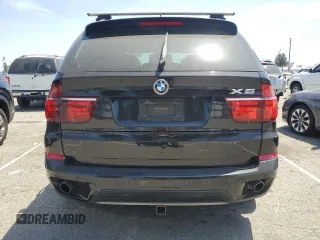 2012 BMW X5 35i z VIN 5UXZV4C51CL744313, wystawiony jako Copart lot #58270755 z przebiegiem 97 903 mil mil oraz Szkoda całkowita • Salvage title. Historia ofert i sprzedaży dostępna na DreamBid. Obrazek 6.