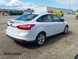 2012 Ford Focus SE with VIN 1FAHP3F2XCL122141, listed as a IAAI auction lot 42008877 with 122,743 mi miles. Bid and sale history available at carsss.com. Image 4.