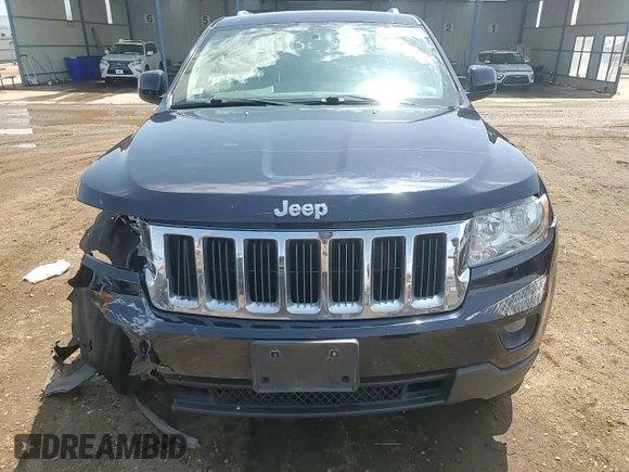2011 Jeep Grand Cherokee Laredo with VIN 1J4RR4GG5BC703628, listed as a Copart auction lot 58626925 with 152,426 mi miles and Salvage title. Bid and sale history available at DreamBid. Image 14.