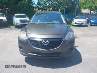 2015 Mazda CX-9 Touring z VIN JM3TB2CV1F0458995, wystawiony jako IAAI lot #42523344 z przebiegiem 130 763 mil mil oraz . Historia ofert i sprzedaży dostępna na DreamBid. Obrazek 12.