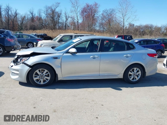 2016 Kia Optima LX with VIN 5XXGT4L37GG084538, listed as a IAAI auction lot 41784807 with 128,928 mi miles. Bid and sale history available at carsss.com. Image 14.