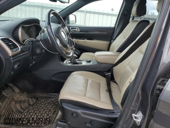 2016 Jeep Grand Cherokee Limited 75th Anniversary with VIN 1C4RJFBG4GC489464, listed as a Copart auction lot 55278935 with 176,572 mi miles and Salvage Title. Bid and sale history available at DreamBid. Image 7.