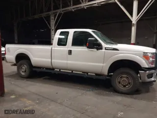 2015 Ford Super Duty F-250 SRW XLT with VIN 1FT7X2B60FEB13045, listed as a IAAI auction lot 41986898 with 299,377 mi miles. Bid and sale history available at carsss.com. Image 13.