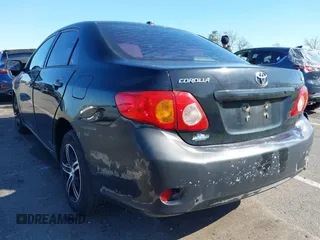 2010 Toyota Corolla with VIN 2T1BU4EE0AC291034, listed as a IAAI auction lot 42059810 with 132,363 mi miles. Bid and sale history available at carsss.com. Image 3.