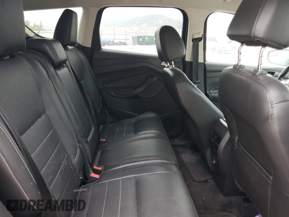 2013 Ford Escape SEL z VIN 1FMCU9H91DUA34614, wystawiony jako Copart lot #61978405 z przebiegiem 103 218 mil mil oraz Czysty tytuł • Clean title. Historia ofert i sprzedaży dostępna na DreamBid. Obrazek 10.